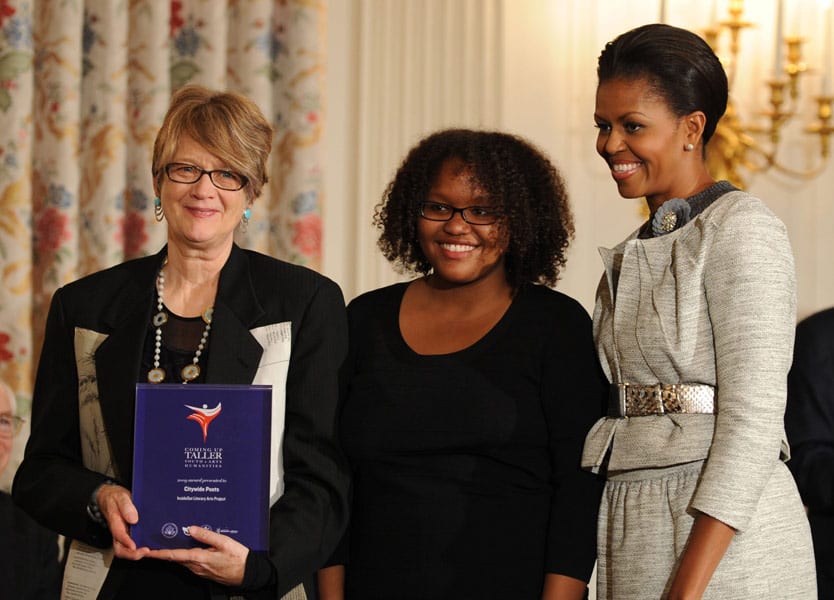 InsideOut Literary Arts Detroit - Michelle Obama presents Dr. Terry Blackhawk with the Coming Up Taller Award for excellence in after-school programming in 2007.