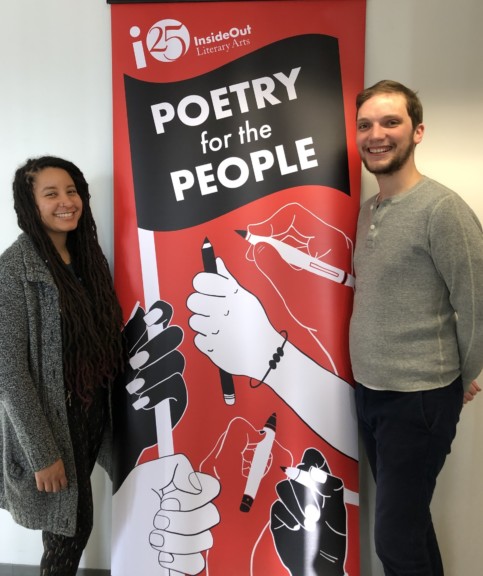 Poetry for the People banner is photographed between two InsideOut staff members