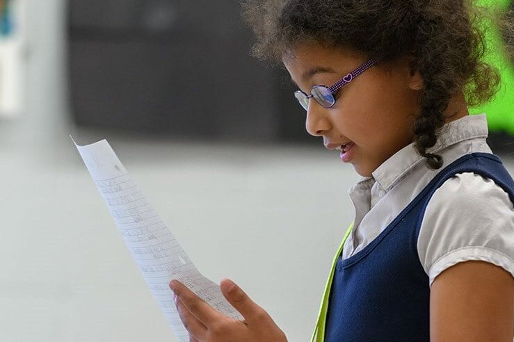 young girl reading 